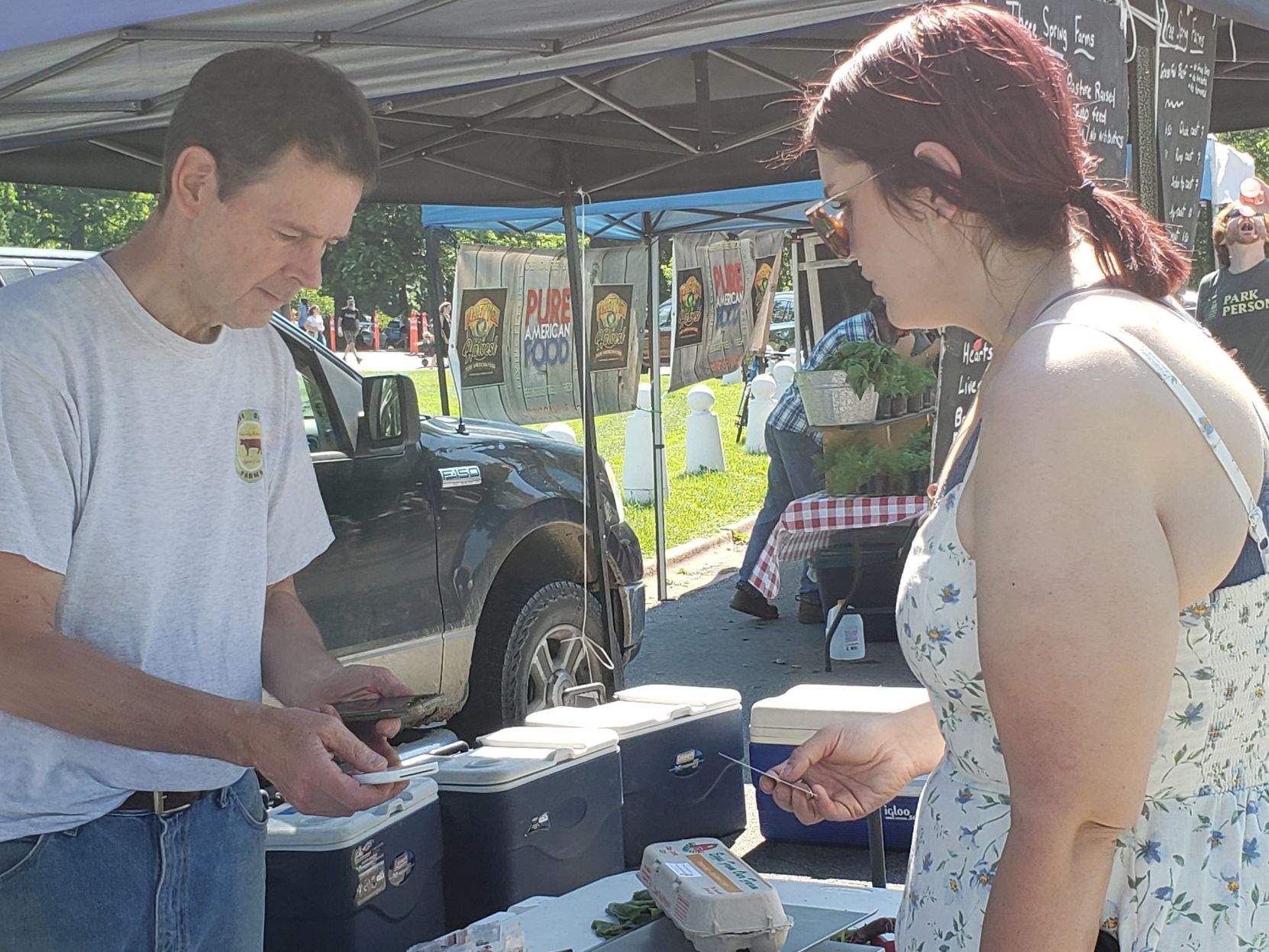 Dr. Bryan Meyers, left, selling product to Sophia Ramirez